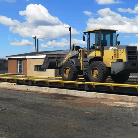 heavy sacale weighbridge with a TLB in Johannesburg